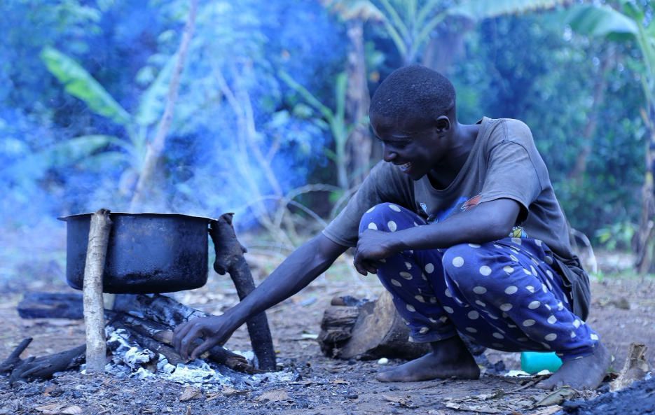 Cooking with biomass and basic materials in Kikumbi, Mityana District, Uganda.