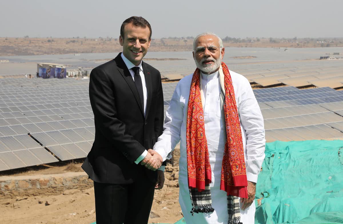 Indian Prime Minister Narendra Modi with France’s Emanuel Macron at a new solar power plant in Mirzapur, India