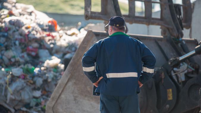 A recycling worker at an unidentified location in the US.
