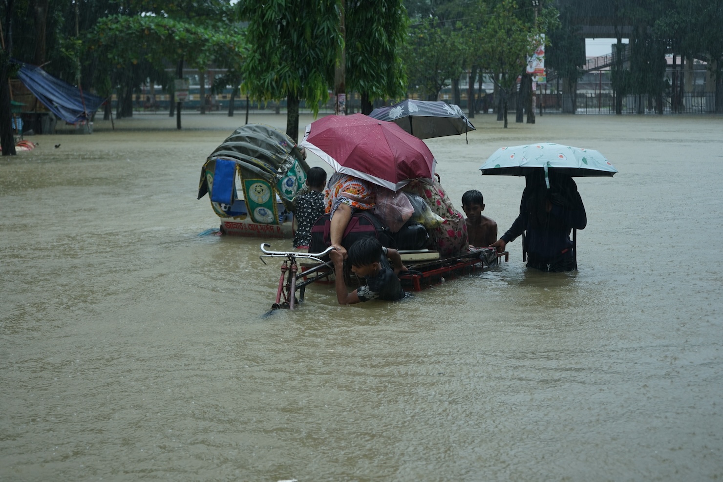 A photograph of a flooded street in Bangladesh in 2022.